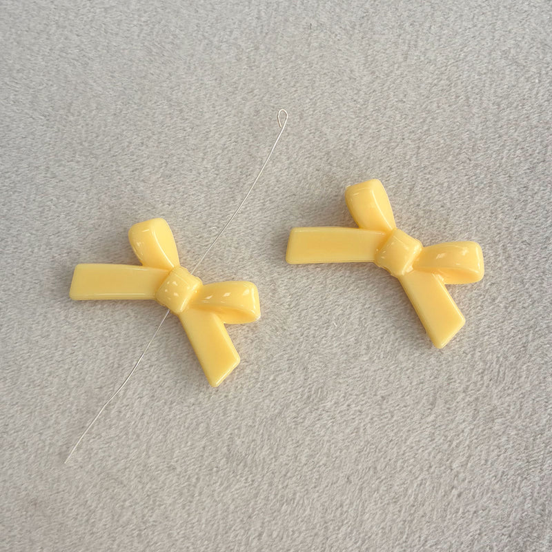 Perles d'espacement en forme de Bowknot acrylique