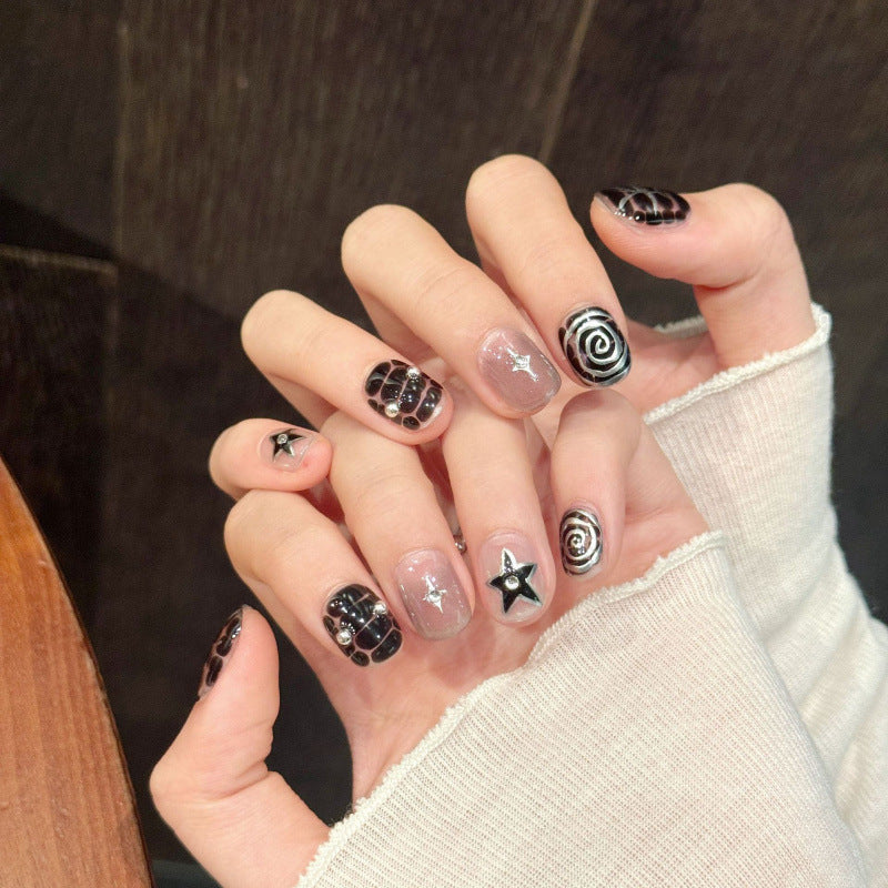 Doucement cool et épicé style Tomboy peint à la main Niche haut de gamme flottant Conseils d'ongle portable