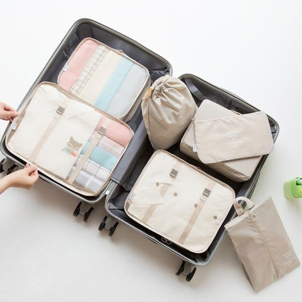 Ensemble d'organisateurs de voyage de sept pièces pliable et portable de grande capacité