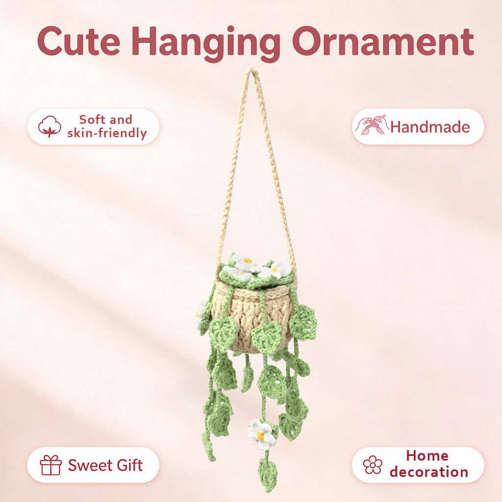 Crochet à la main suspendu ornement en pot avec traces blanches trailing et les feuilles vertes