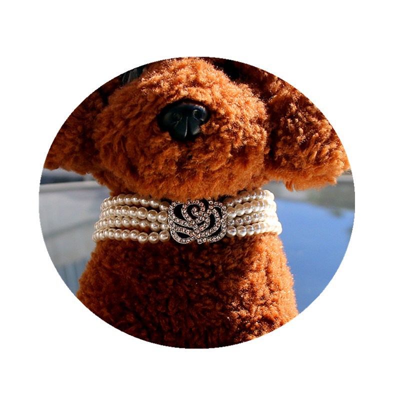 Accessoire à quatre rangées de chat rose et d'ornement de chien