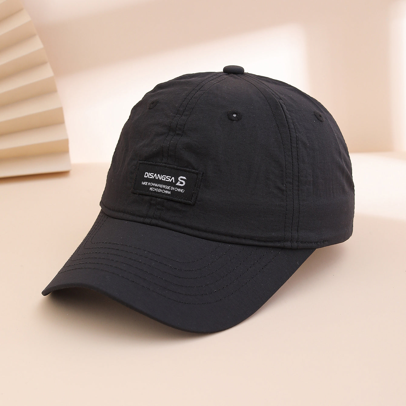 Version coréenne d'une simple lettre brodée de couleur solide Séchage rapide Casquette de baseball avec A