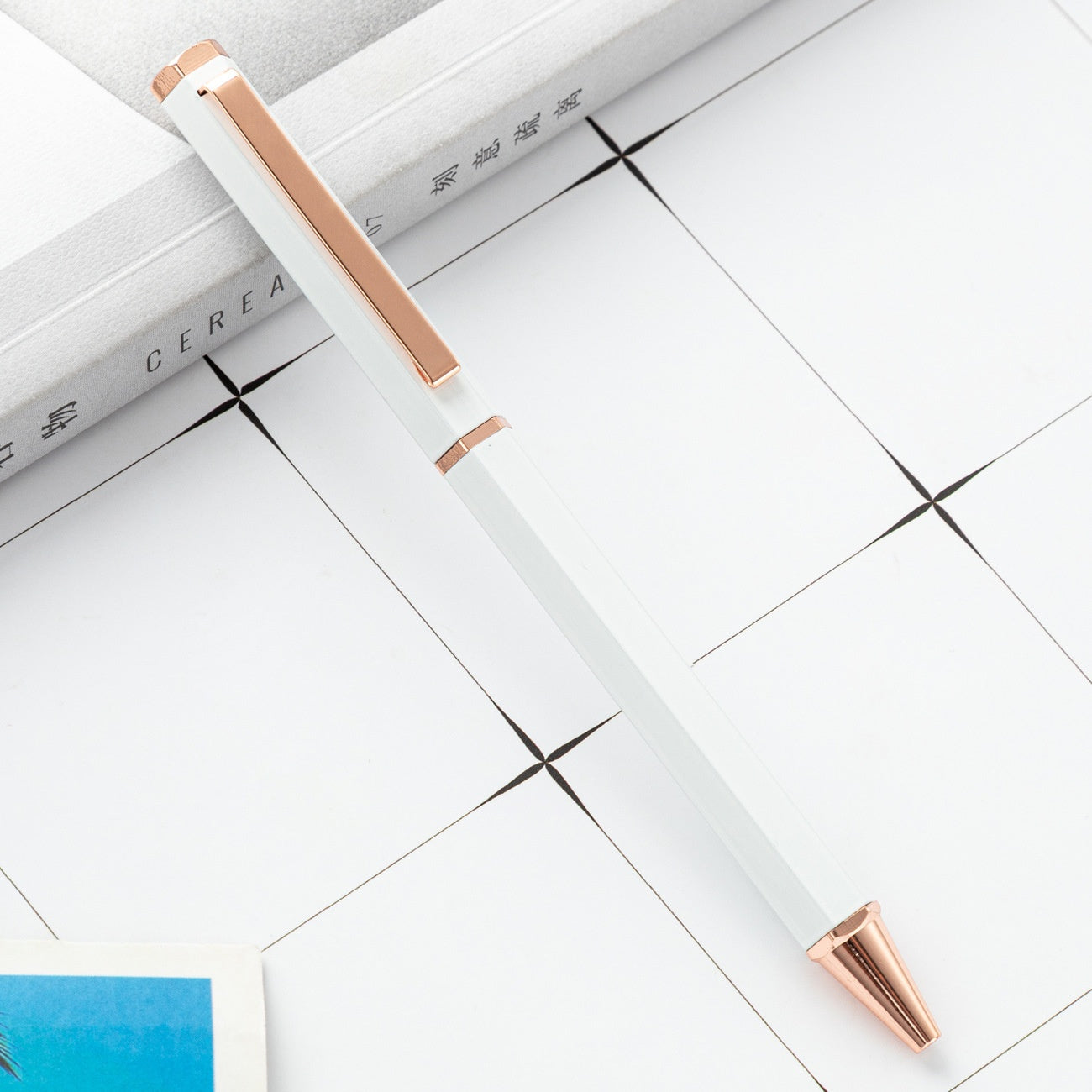 Stylo à rotule métallique simple à six angles