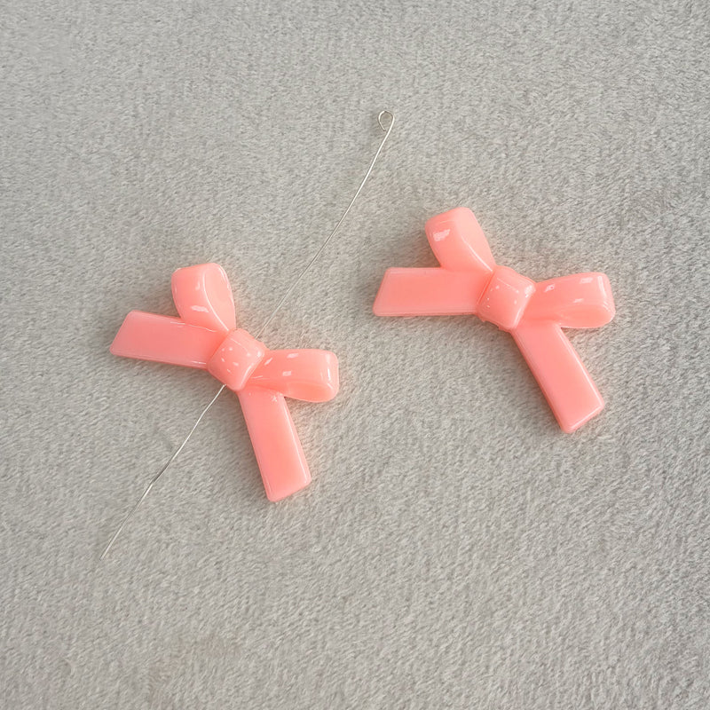 Perles d'espacement en forme de Bowknot acrylique