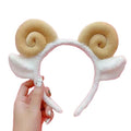 Coincer mignon en peluche de moutons