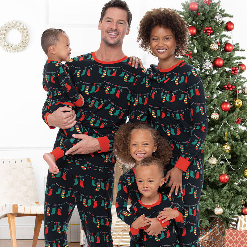Famille imprimée européenne et américaine de quatre vêtements parent-enfant de Noël