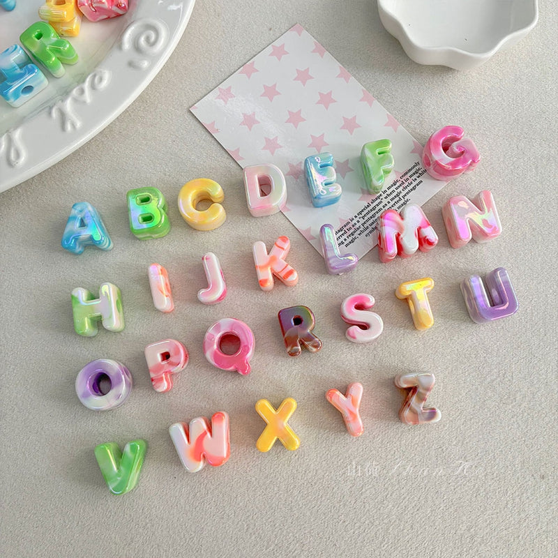 Perles à lettres acryliques plaquées UV