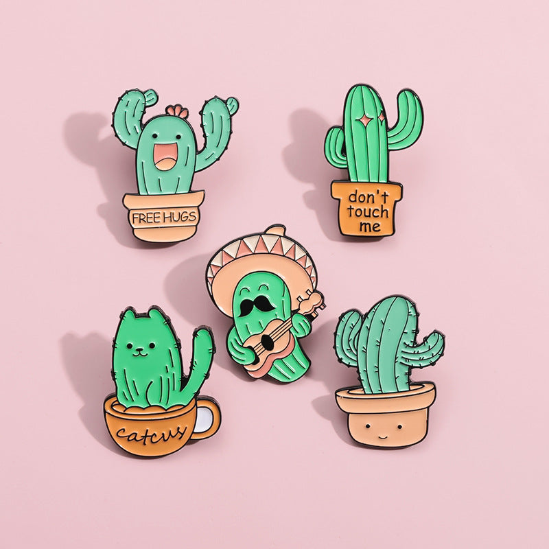 Mignon chant et danse Cactus forme Golden M Accessoires insigne