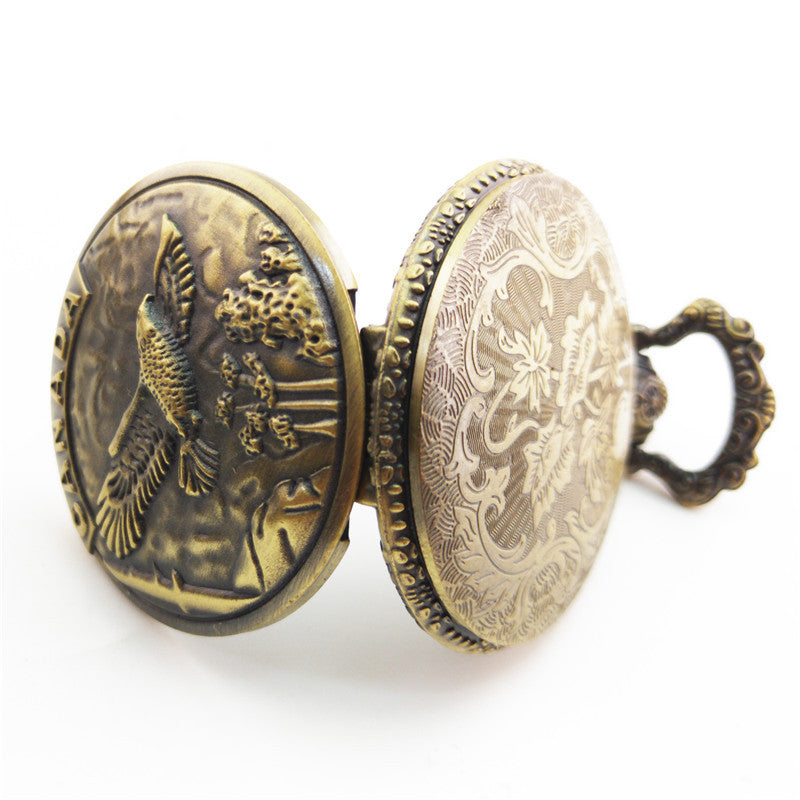 Vieille montre de poche fléchée aux gros oiseaux