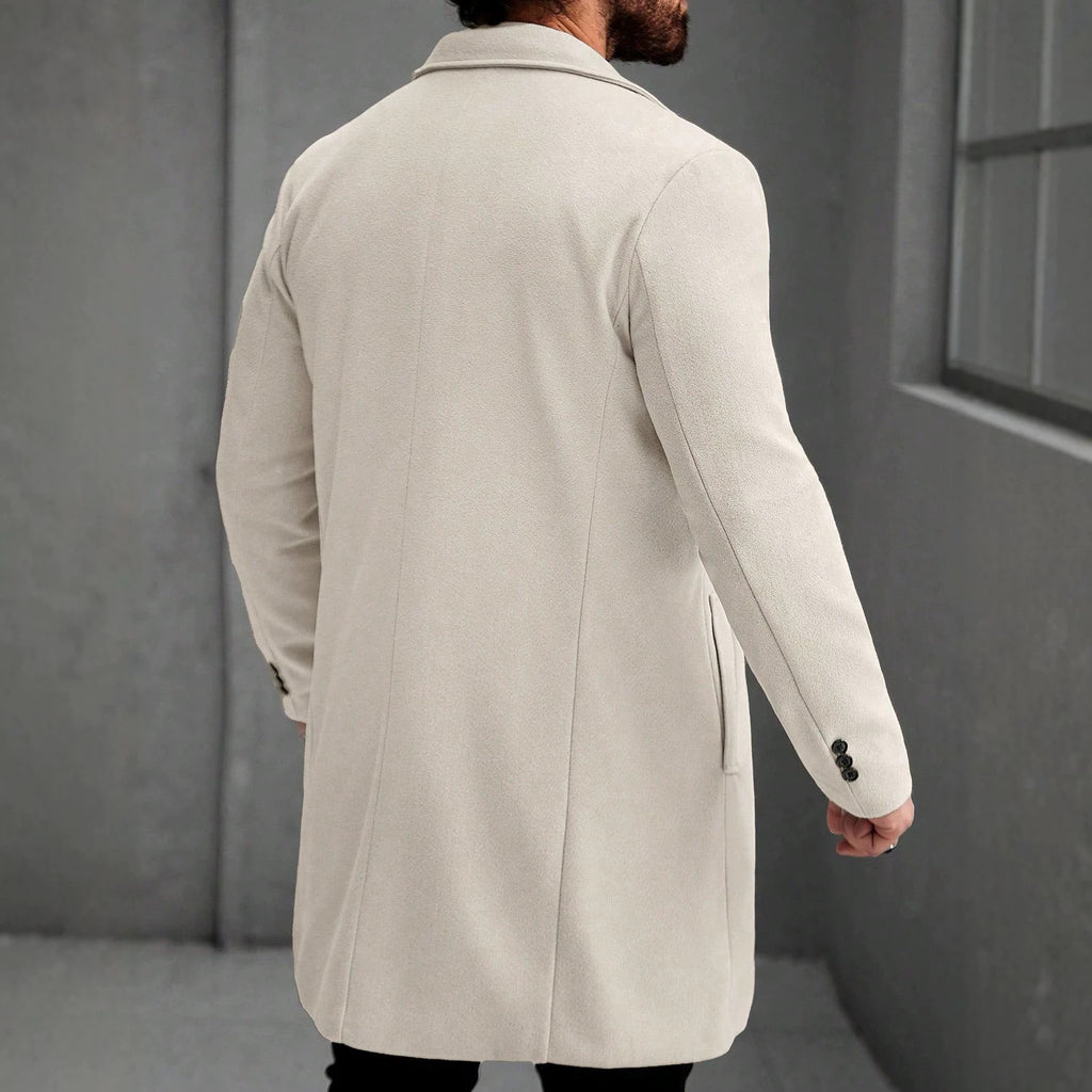Manteau mi-long en laine de couleur solide