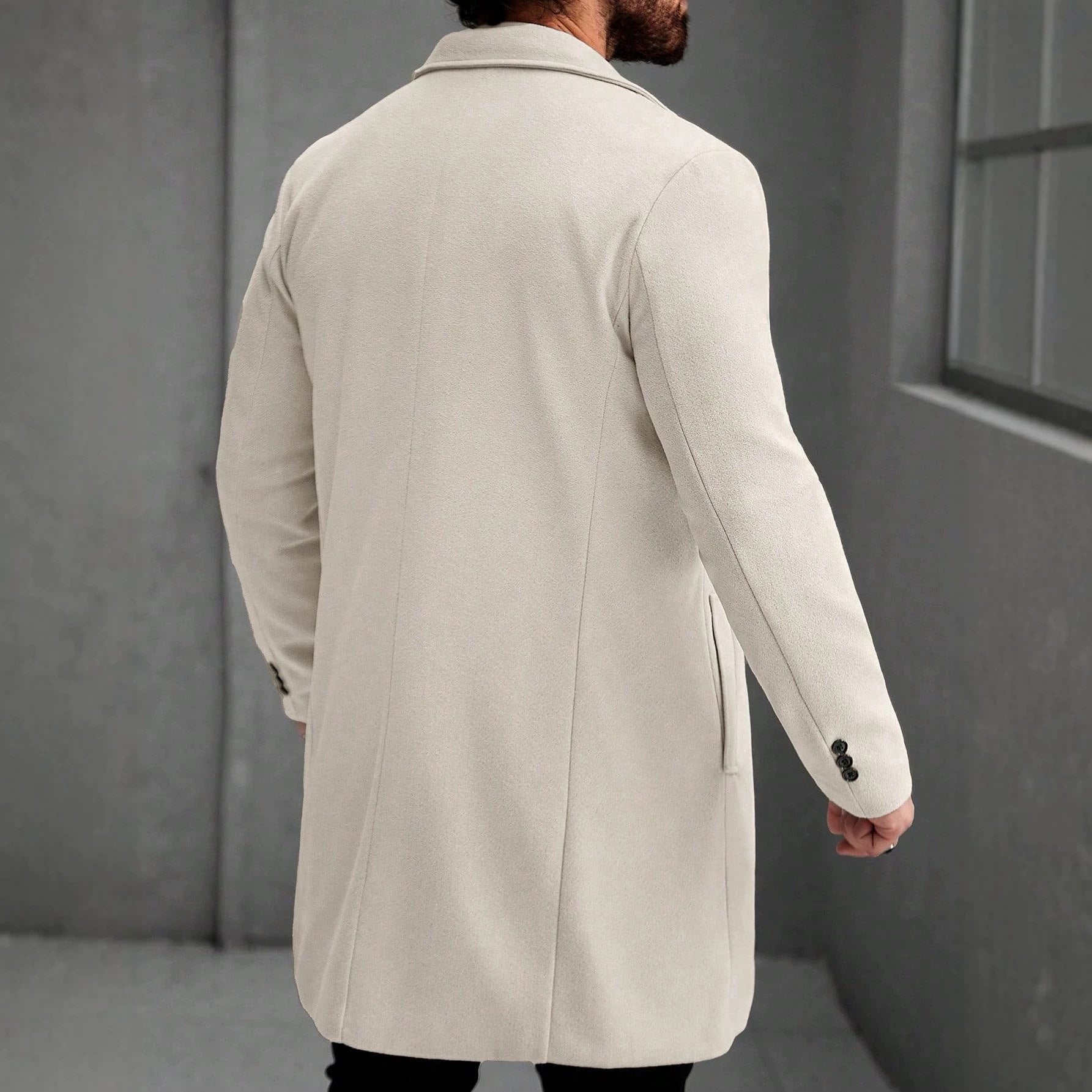 Manteau mi-long en laine de couleur solide