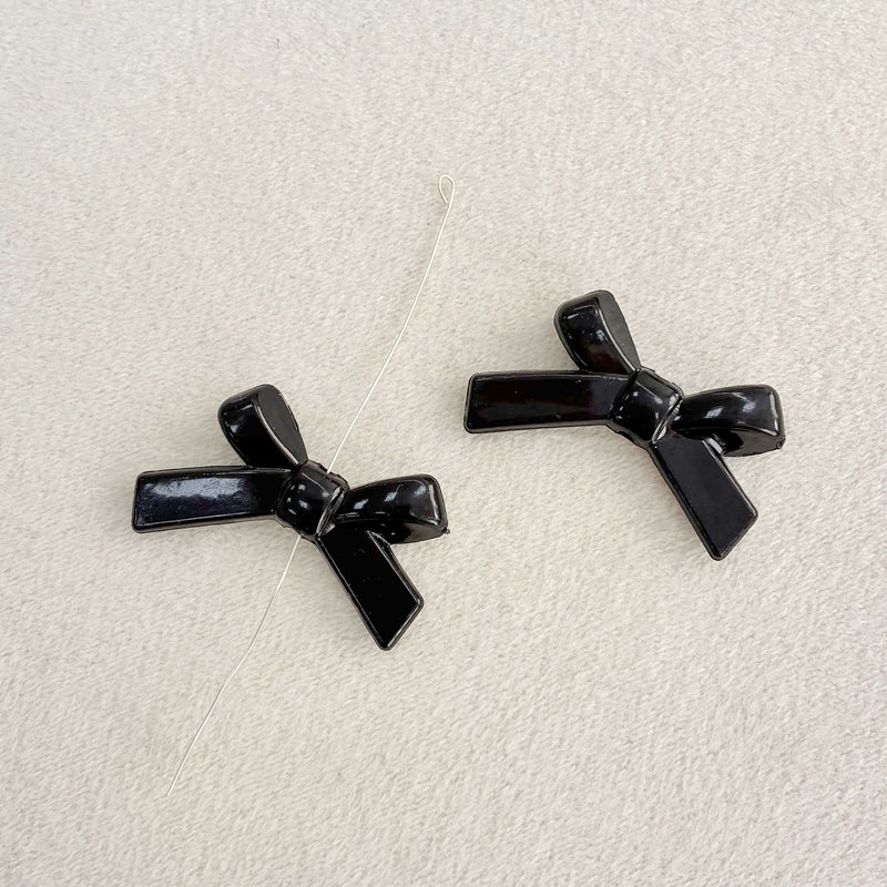Perles d'espacement en forme de Bowknot acrylique