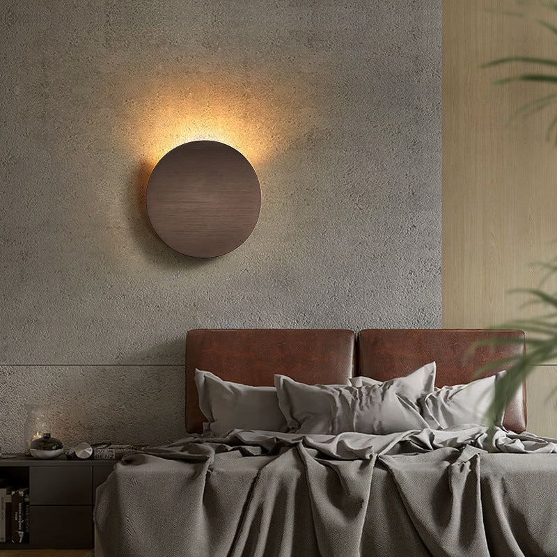 Lampe murale simple côté lit