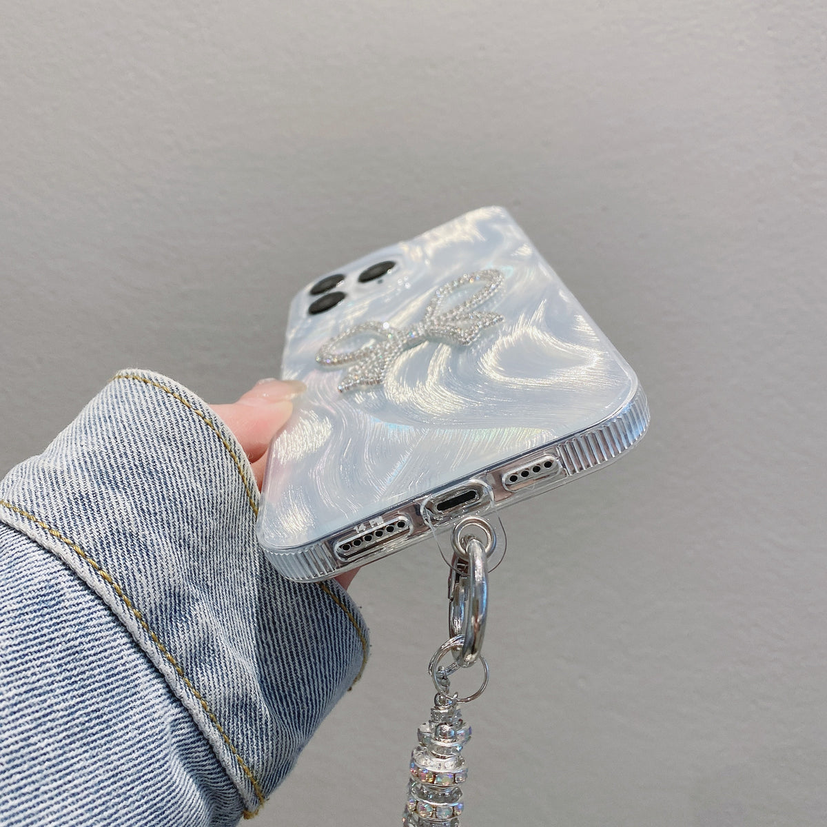 Cas de téléphone à chaîne en fils de plumes de luxe Bow