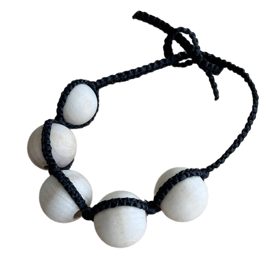 Collier tressé Pearl Raffia
