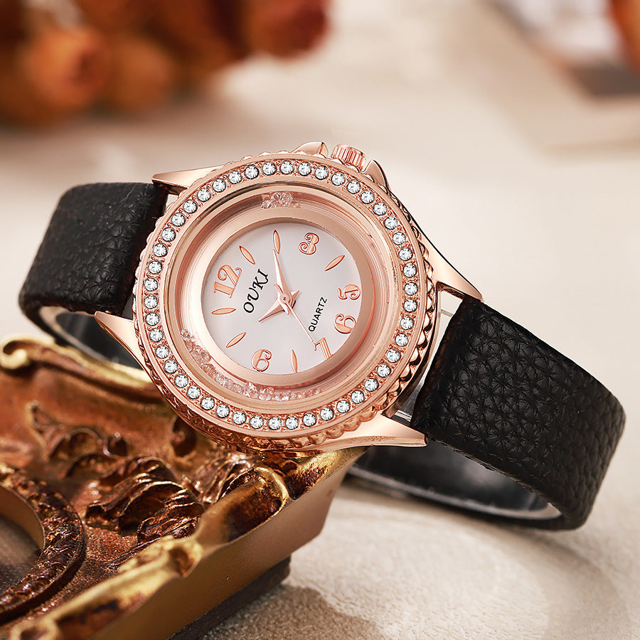Élégante et minimaliste montre féminine ronde en strass