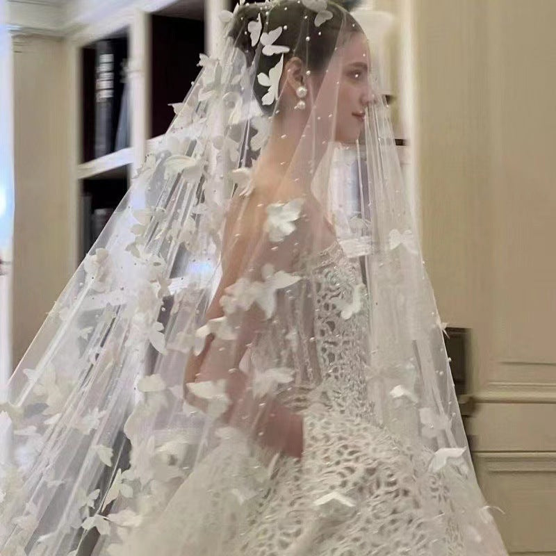 Veil à papillon tridimensionnel blanc nuptial