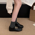 Femmes Vintage British Carved Flats