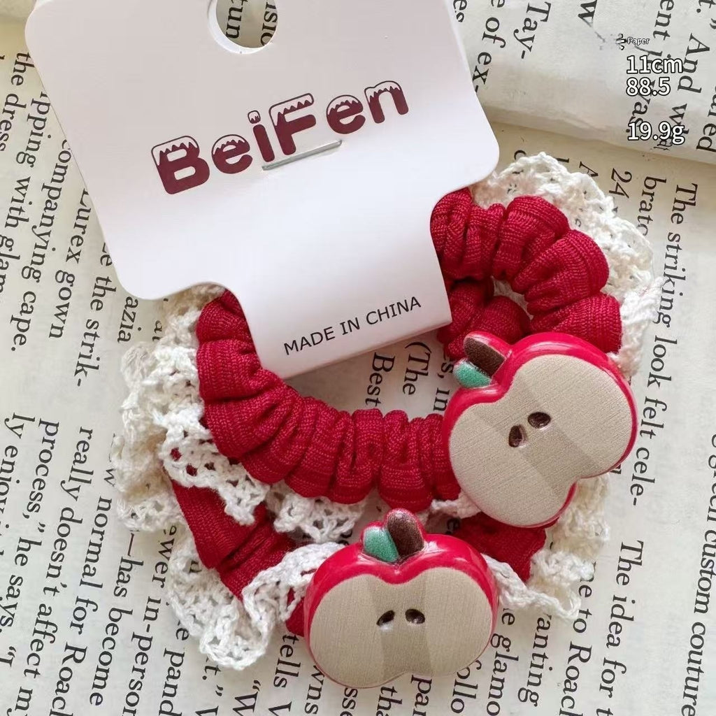 Cartoon créatif Apple et accessoires de coiffure Star avec thèmes de Noël et année