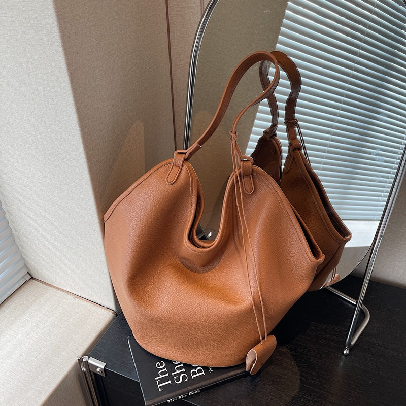 Vieux sac de seau de lit pour femmes