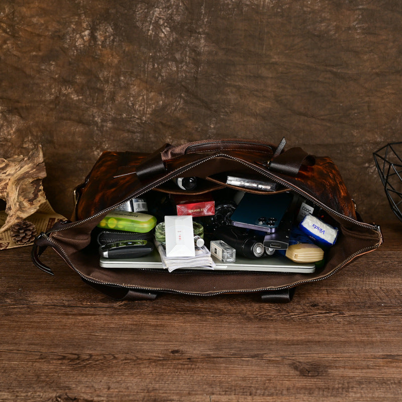Vieux sac de voyage en cuir fourre-tout fabriqué à partir de Cowhide plein grain