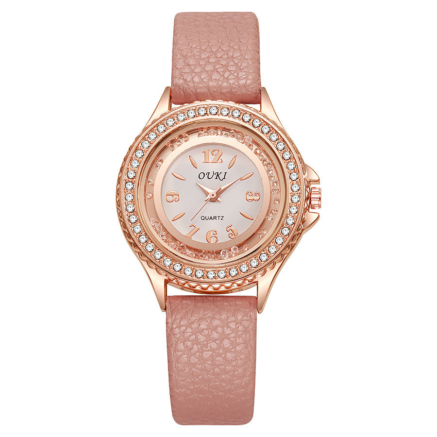 Élégante et minimaliste montre féminine ronde en strass