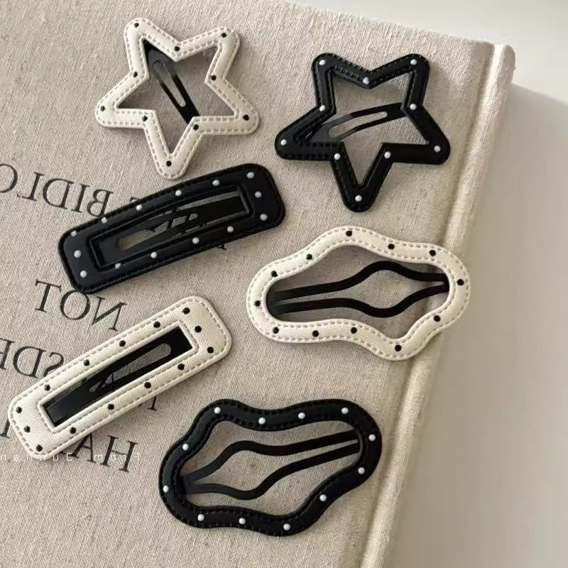 Black and white five-point star leather clip