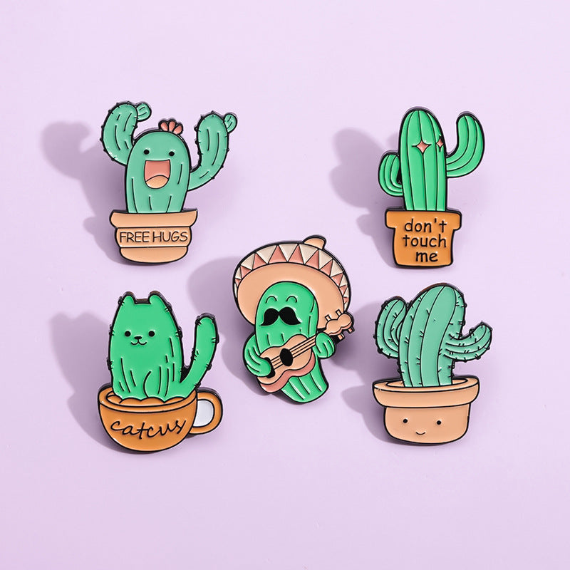 Mignon chant et danse Cactus forme Golden M Accessoires insigne