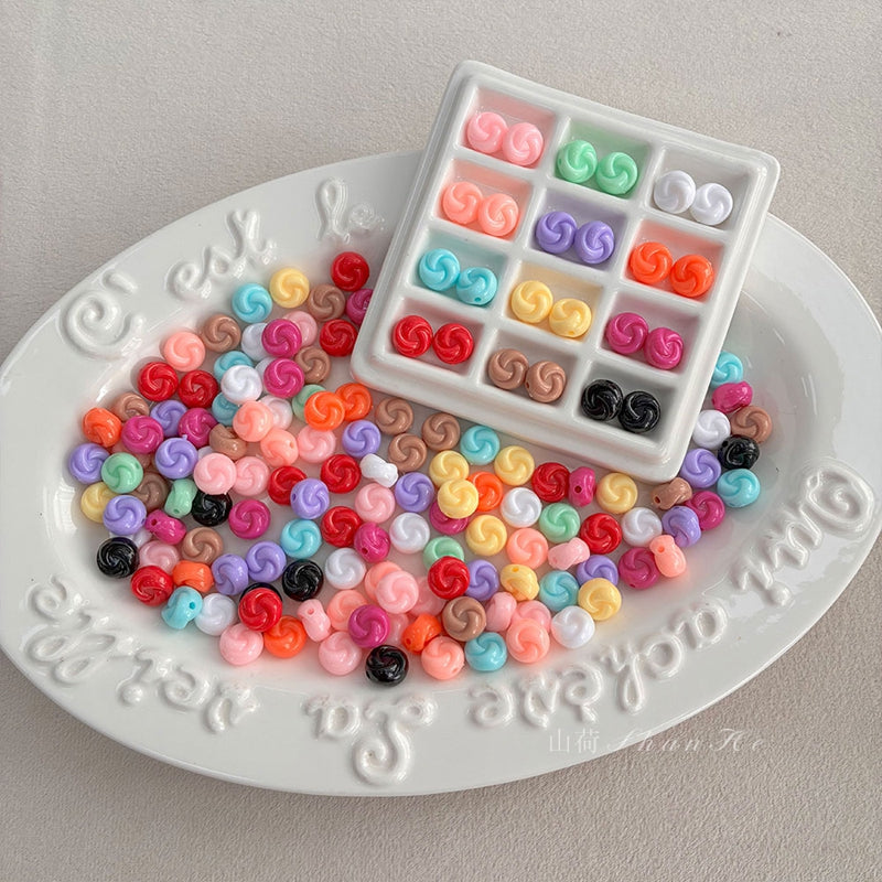 Perles pivotantes en couleur solide PS