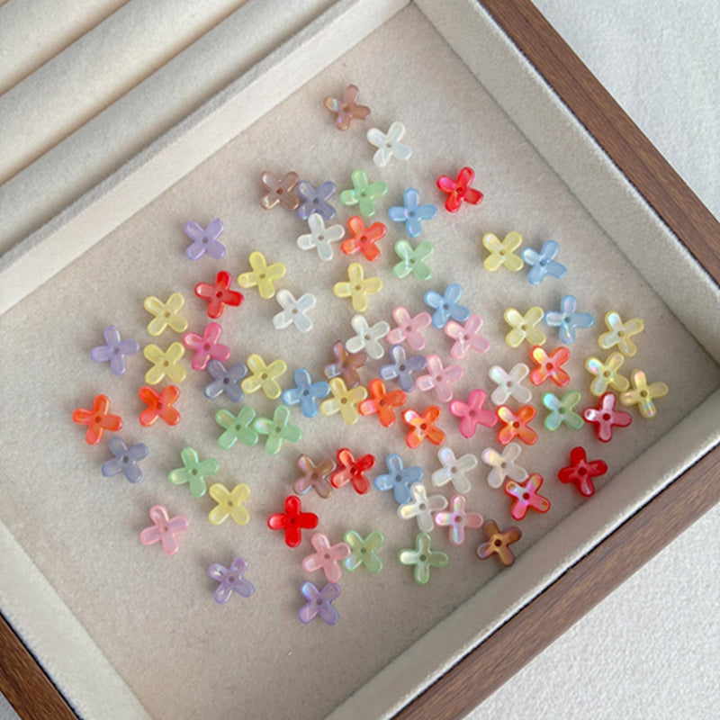 Perles de fleurs en acrylique avec paillettes dorées
