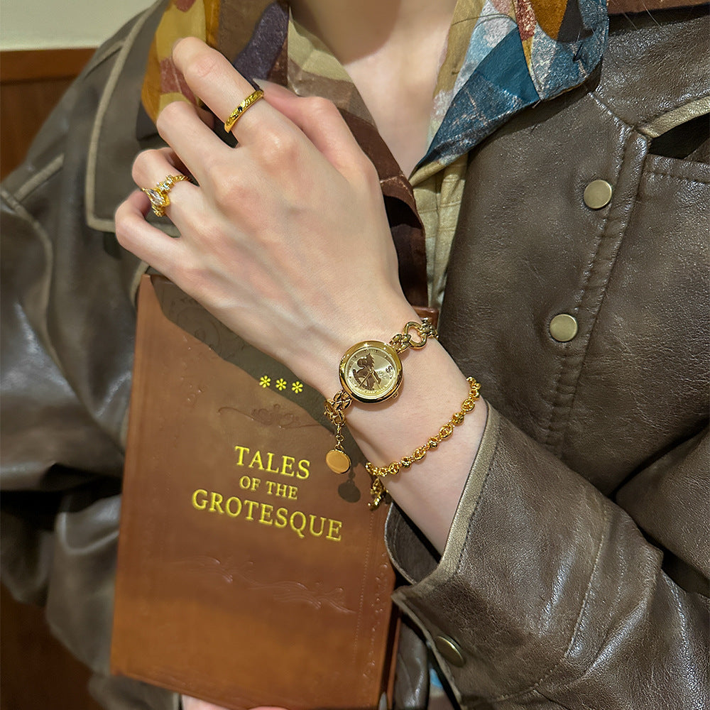 Rétro style mi-siècle bracelet en or montre avec un Niche design-avant esthétique