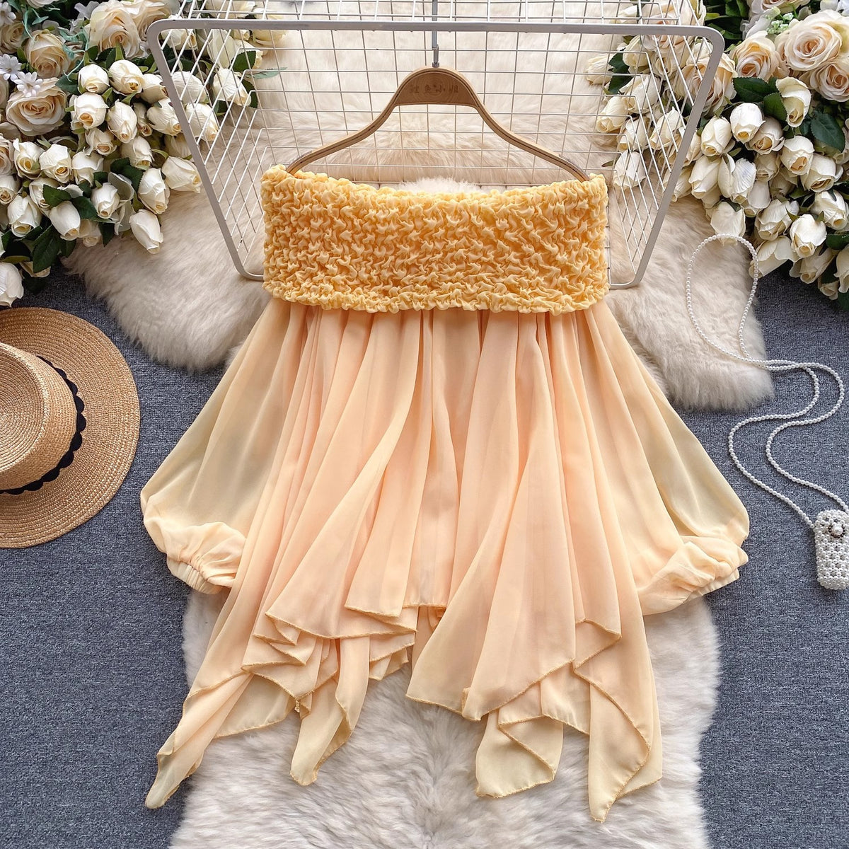 Asymmetric halter neck blouse with cuffs