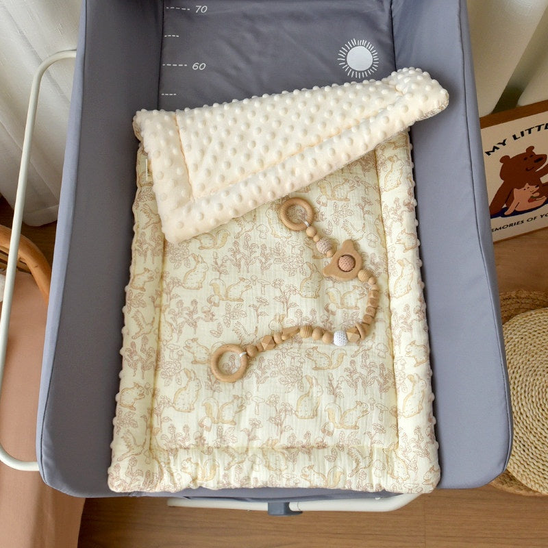 Pad de coton pour les tables de changement de bébé adapté pour toutes les quatre saisons
