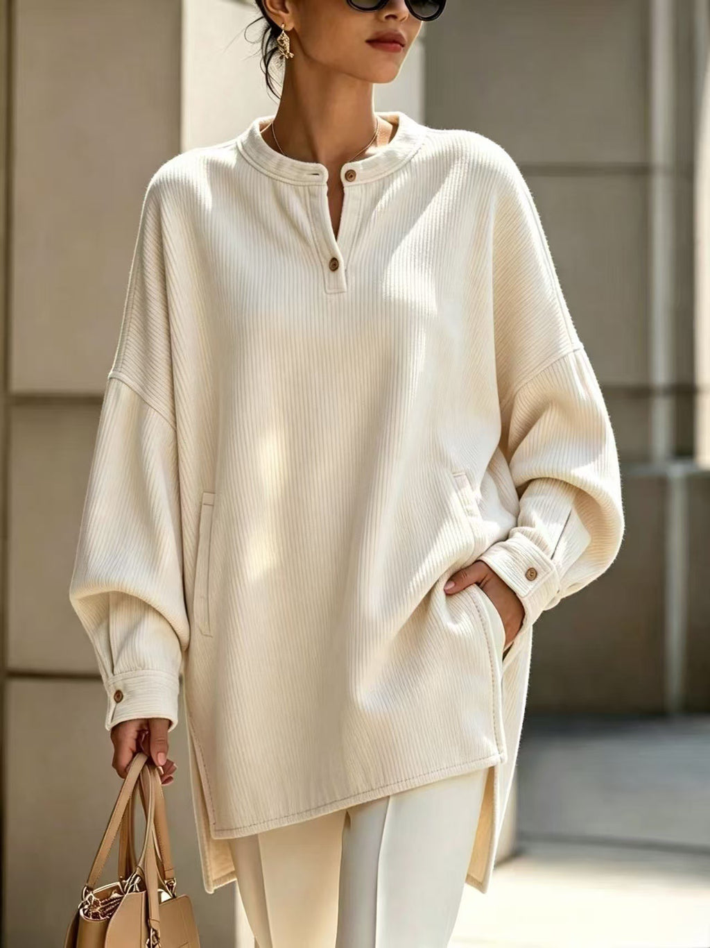 T-shirt à manches longues pour femmes avec un collier Henley