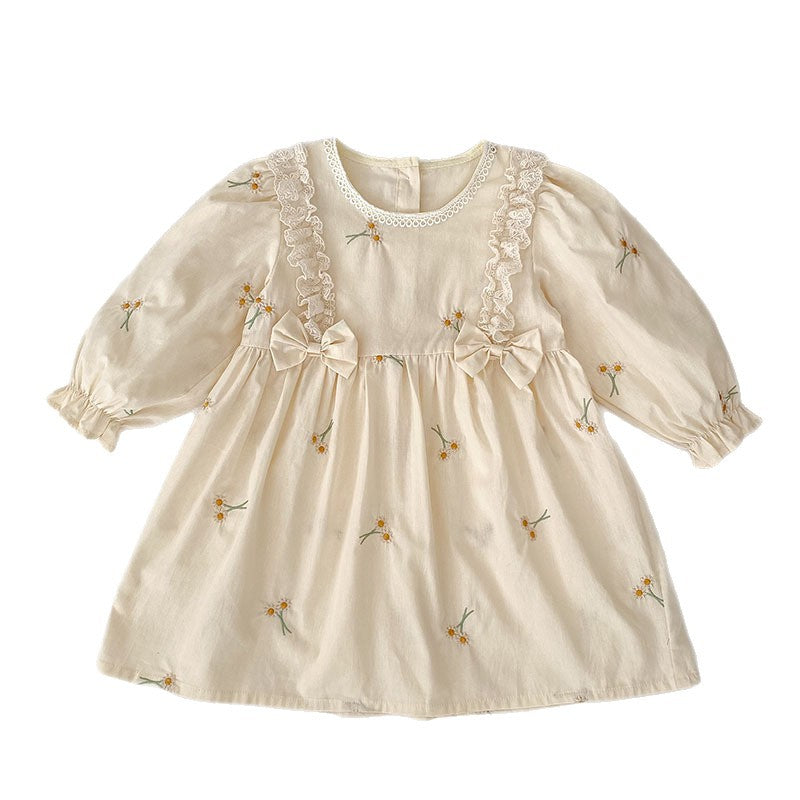 Baby bodysuit with long sleeves, bow, and embroidery