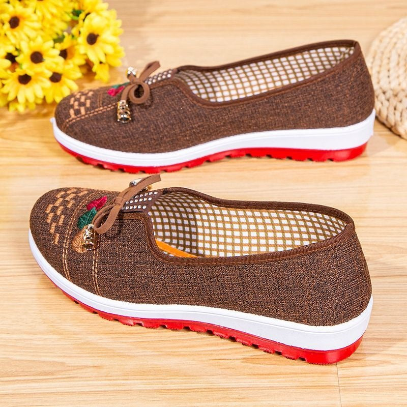 Chaussures en tissu brodé antidérapant avec une semelle souple