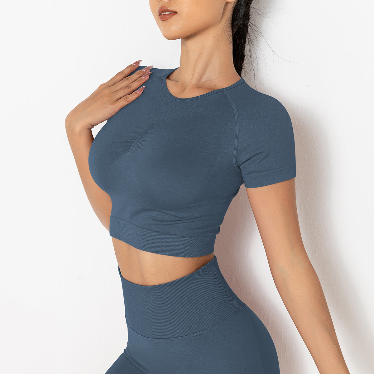 Tee-shirt sans couture tricoté en couleur solide Sports Running Fitness Yoga Porter à manches courtes