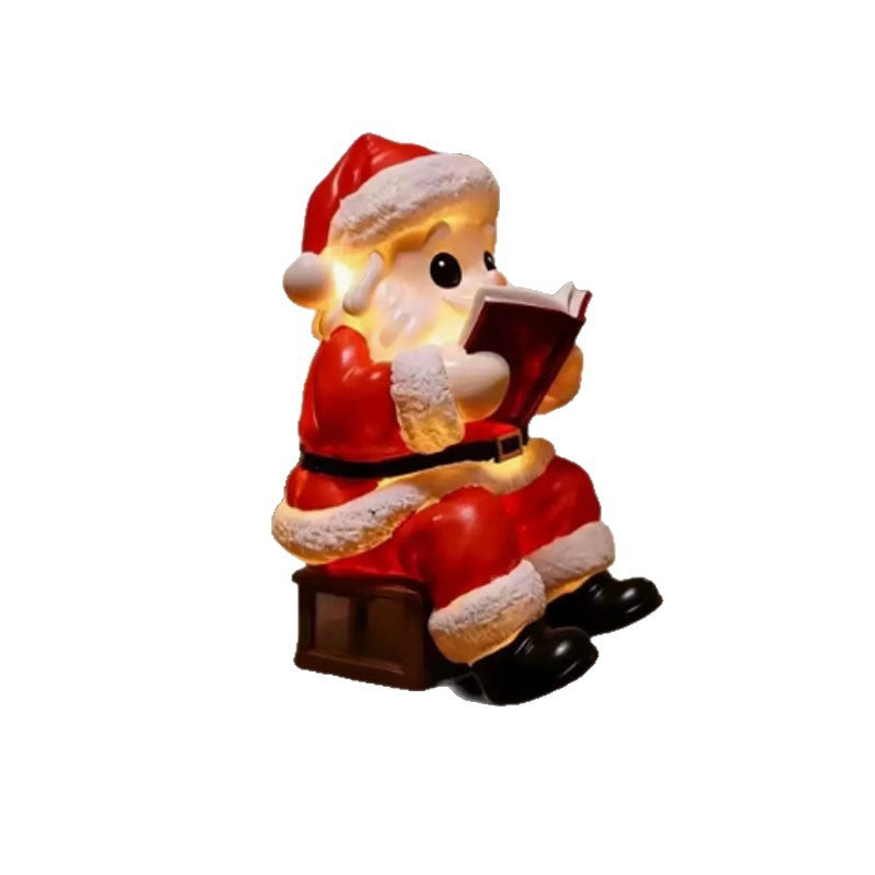 Lampe de lecture du livre du Père Noël