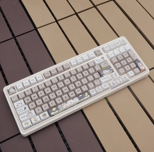 Clavier mécanique gris laiteux sur le thème de la souris