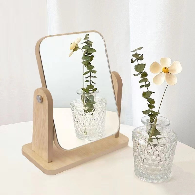 Vieux miroir de maquillage rotatif en bois