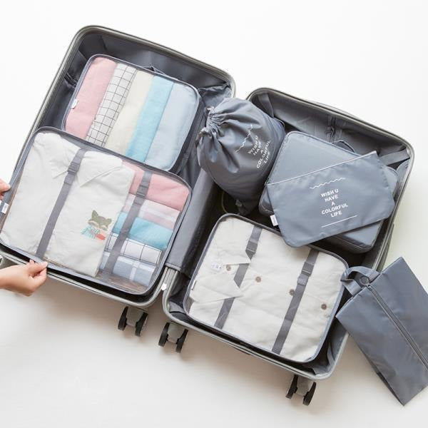 Ensemble d'organisateurs de voyage de sept pièces pliable et portable de grande capacité