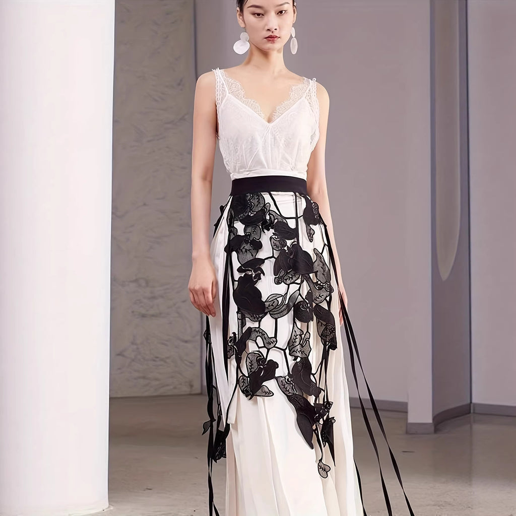 Jupe noire détaillée et détaillée avec une pointe amovible et un design en tie-waist