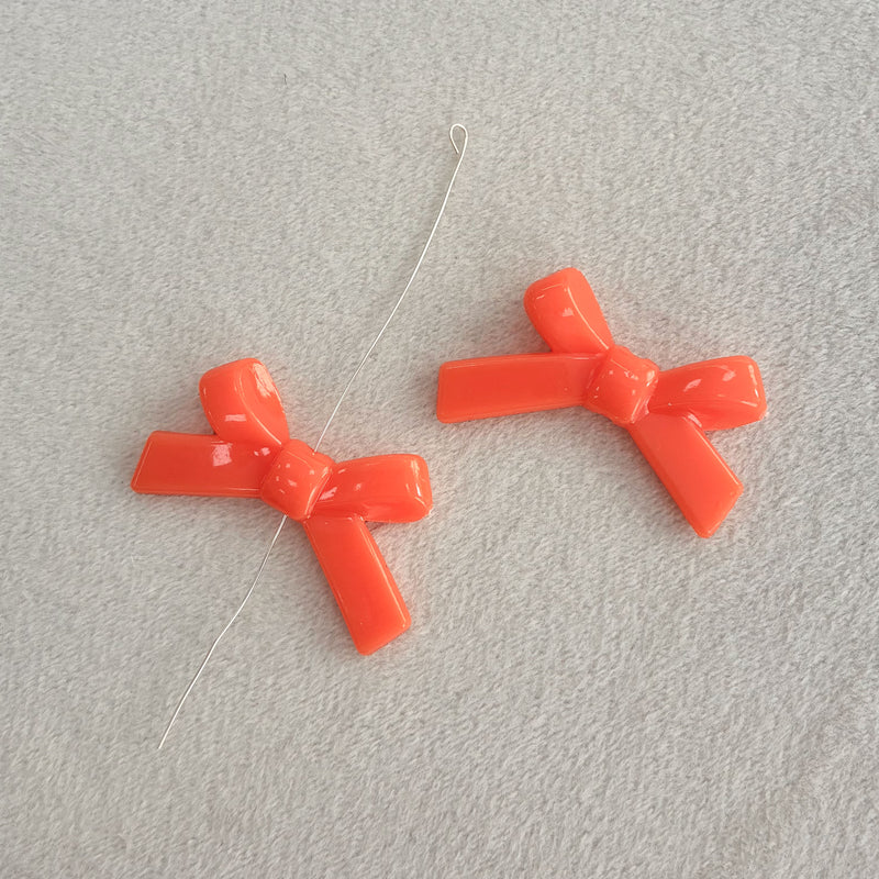 Perles d'espacement en forme de Bowknot acrylique