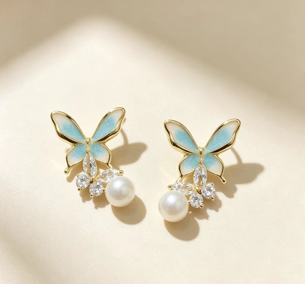 Boucles d'oreilles Élégantes à aiguilles en argent haut de gamme Pearl Butterfly