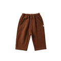Garçon couleur solide avec des pantalons épais en fourrure