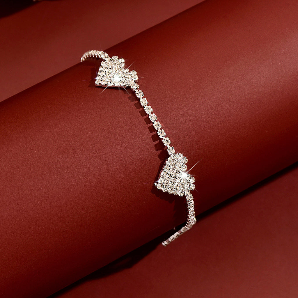 Femmes Quatre coeurs Pavés CZ Collier Choker