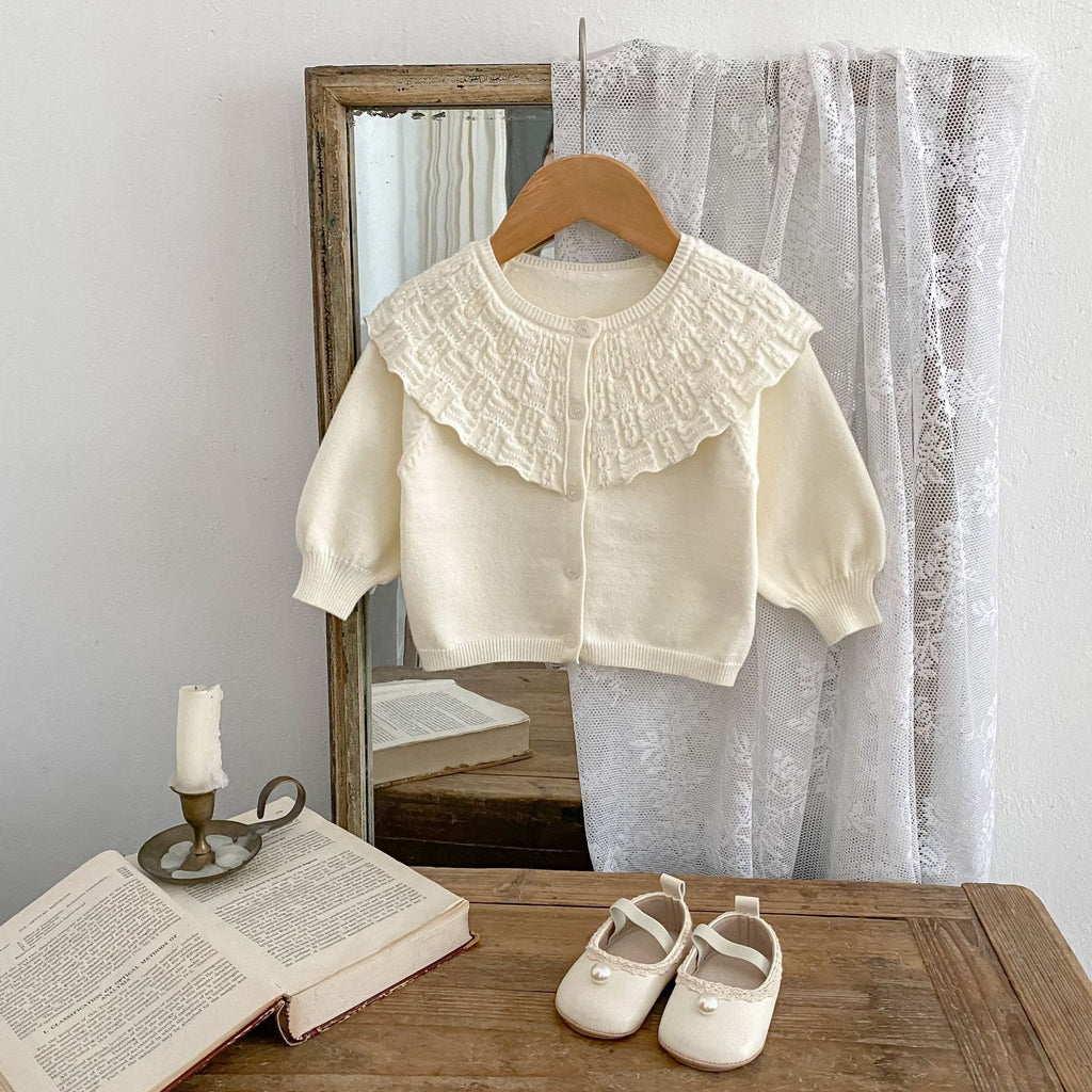 Manteau tricoté pour bébé