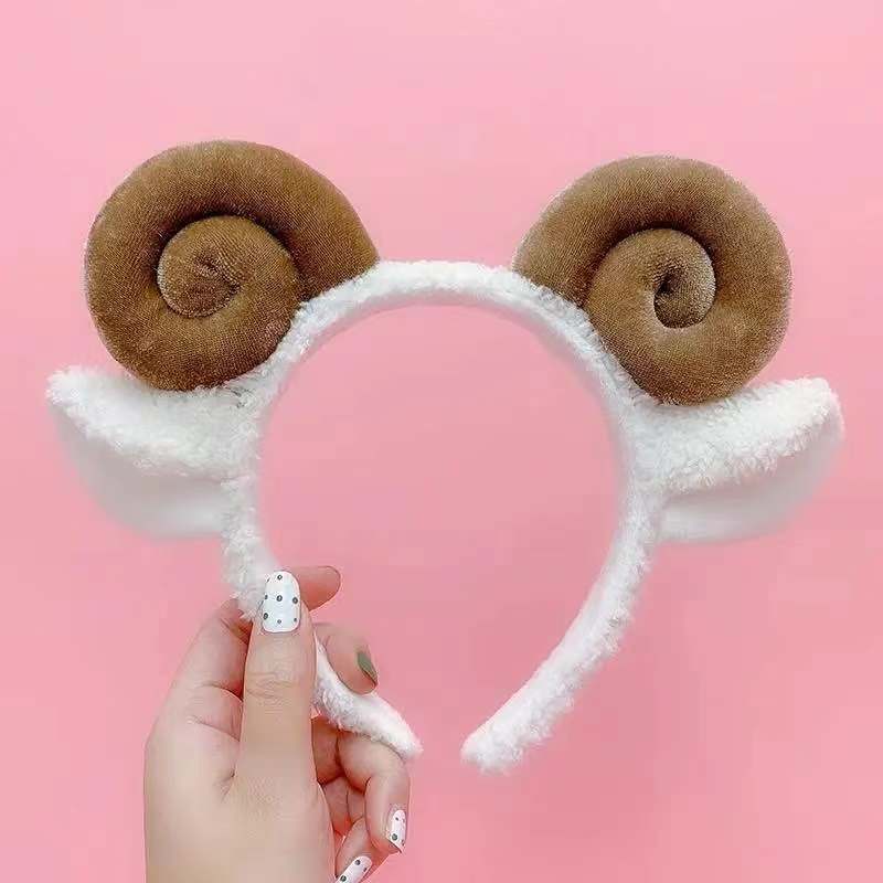 Coincer mignon en peluche de moutons
