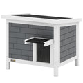 Maison de chat en plein air isolée avec toit ouvert