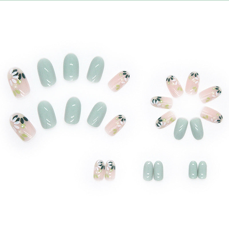 Nails à tête ronde avec de petites fleurs pour les femmes
